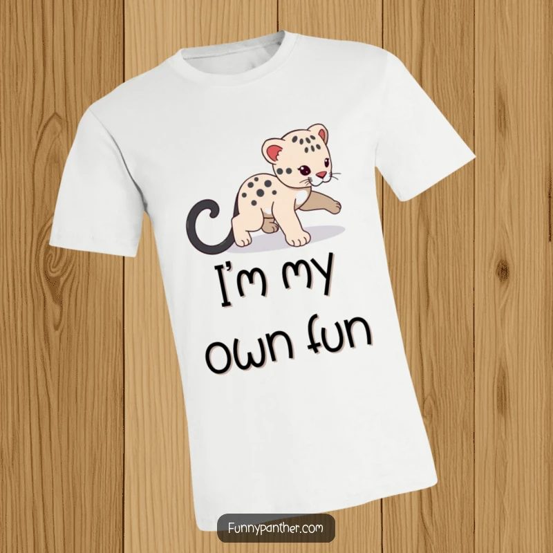 Funny panther cub t-shirt, playfully chasing its shadowy tail, showcasing adorable and humorous energy.