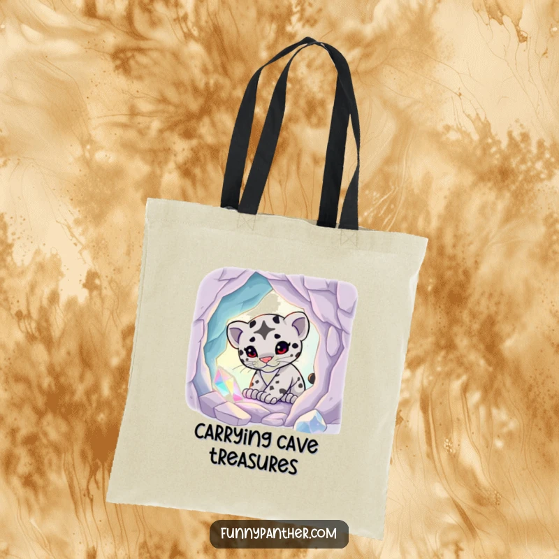 Funny tote bag illustrated with a playful panther cub exploring a mystical, glowing crystal cave, perfect for enchanted shopping.